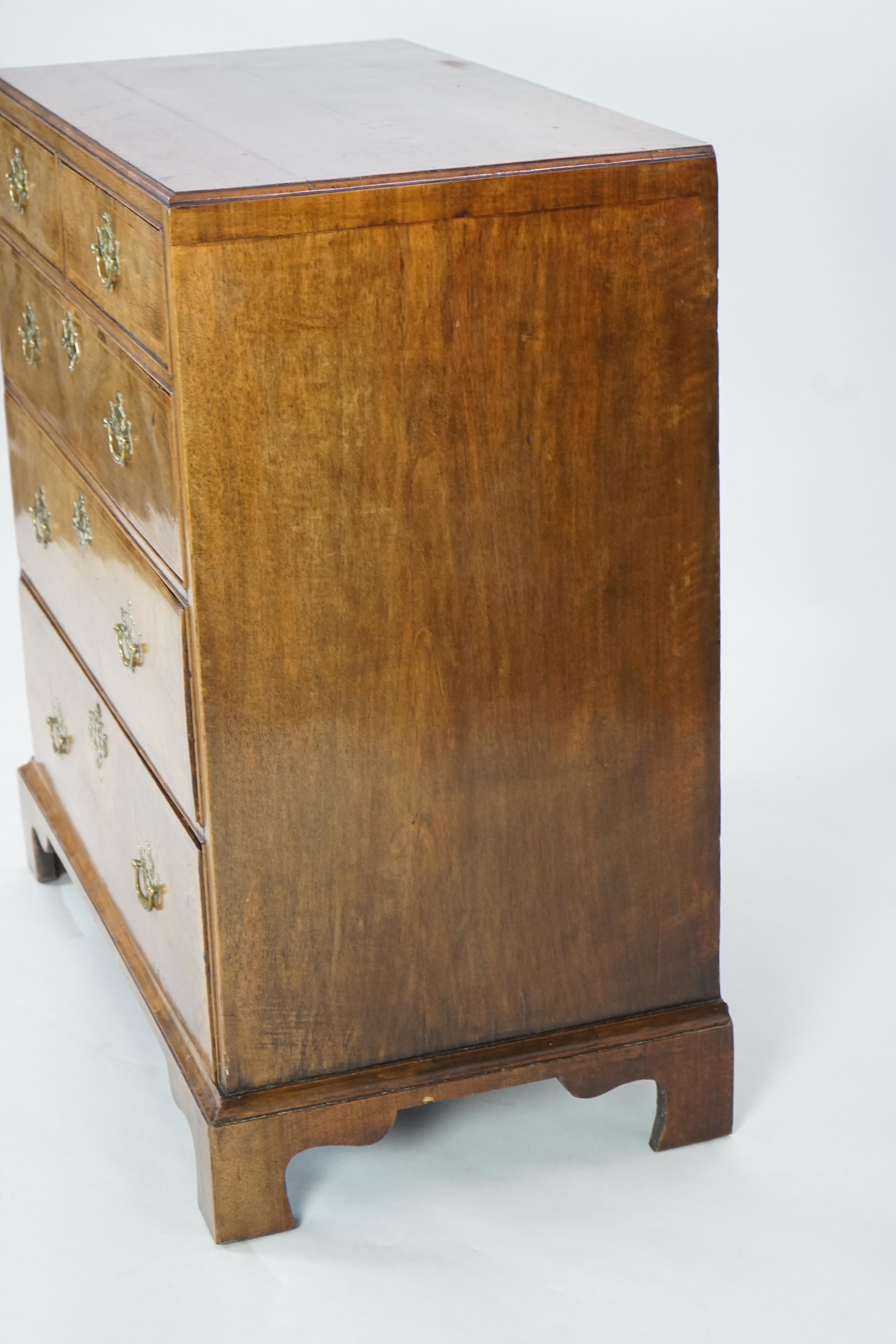 A George II walnut and feather banded caddy top chest